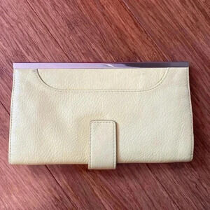 Leather clutch - yellow - magnetic closure - lots of storage - great condition